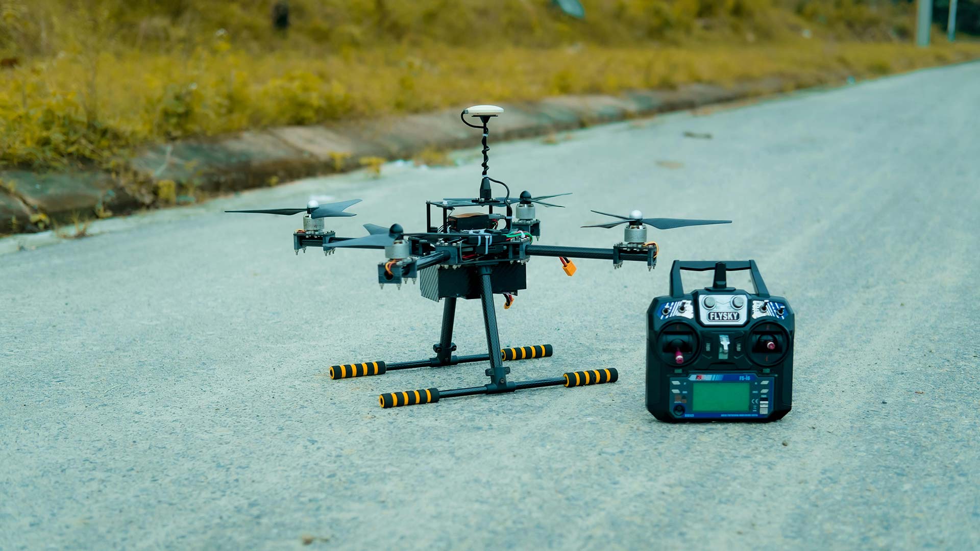 Professional drone with FlySky controller ready for commercial property cleaning in South Florida